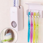 Автоматски диспанзер за паста за заби со држач за четки
